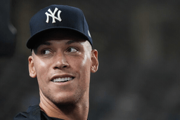 New York Yankees' Aaron Judge smiles towards fans during a baseball game against the Houston Astros, Wednesday, Aug. 26, 2026, in New York. (AP Photo/Ryan Murphy)