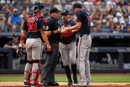 Atlanta Braves pitcher Chris Sale, right, argues with home plate umpire Dan Merzel, second left, during the fifth inning of a baseball game against the New York Yankees, Saturday, Aug. 8, 2026, in New York. (AP Photo/Yuki Iwamura)
