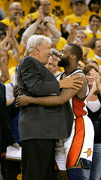 Golden State Warriors' Baron Davis, right, hugs coach Don Nelson in the fourth quarter of an NBA Western Conference first-round basketball playoff game against the Dallas Mavericks in Oakland, Calif., May 3, 2007. (AP Photo/Jeff Chiu, File)