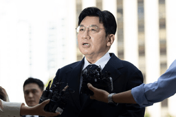 Bang Si-Hyuk, a chairman of Hybe, answers reporters' question upon his arrival at the Seoul Metropolitan Police Agency in Seoul, South Korea, on Sept. 15, 2025. (Kim Keun-soo/Newsis via AP, File)