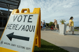 Arizona voters come and go as cast their ballots at a polling location on primary election day, Tuesday, July 21, 2026, in Phoenix. (AP Photo/Ross D. Franklin)