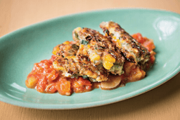 This image released by Voracious shows a recipe for summer vegetable scallion pancakes from the cookbook "Deep Run Roots" by Vivian Howard. (Rex Miller/Voracious via AP)
