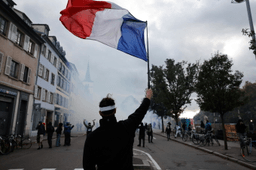 More than 400,000 protest across France, challenging Macron as Paris clashes erupt