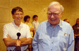Microsoft co-founder and chairman Bill Gates, left, and Berkshire Hathaway Inc. billionaire Warren Buffett laugh while answering questions Aug 5, 2006, before the Nebraska Regional Bridge tournament in Council Bluffs, Iowa. (AP Photo/Dave Weaver, File)