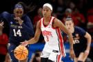 Ohio State guard Kennedy Cambridge (3) brings the ball downcourt past Notre Dame guard KK Bransford (14) during the first half in the second round of the NCAA college basketball tournament, March 23, 2026, in Columbus, Ohio. (AP Photo/Tom E. Puskar, File)