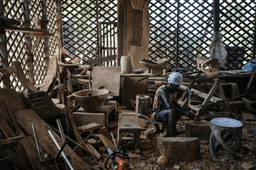 In Suriname's rainforest, Saamaka woodcarvers face the pull of gold mining and logging